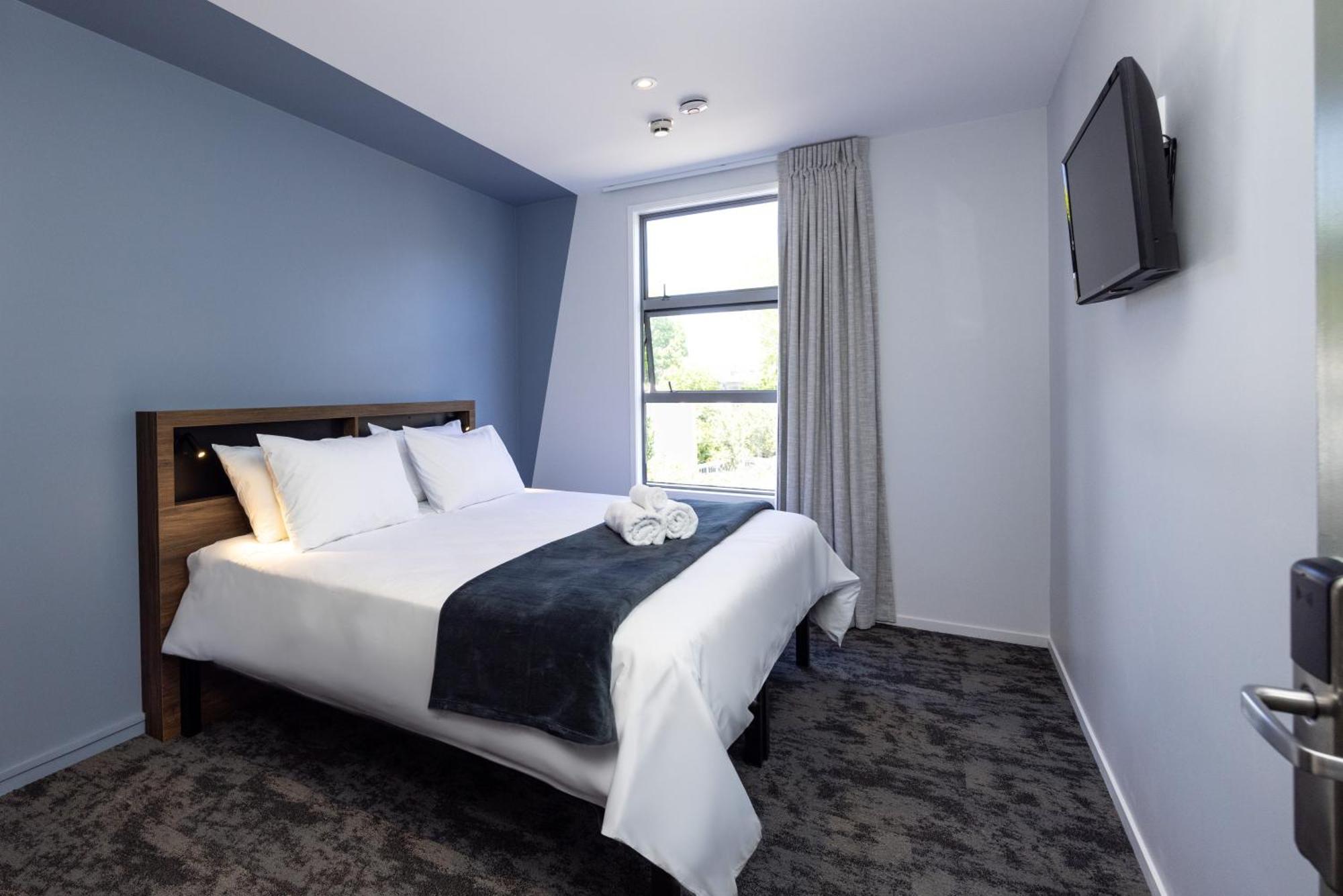 Hostel Haka House Rotorua Exterior foto A bedroom at the hotel